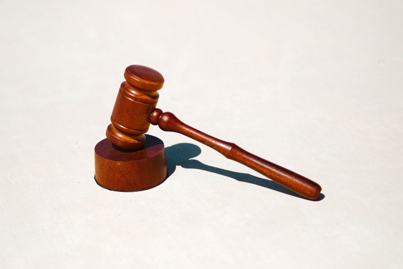 A gavel with a white background