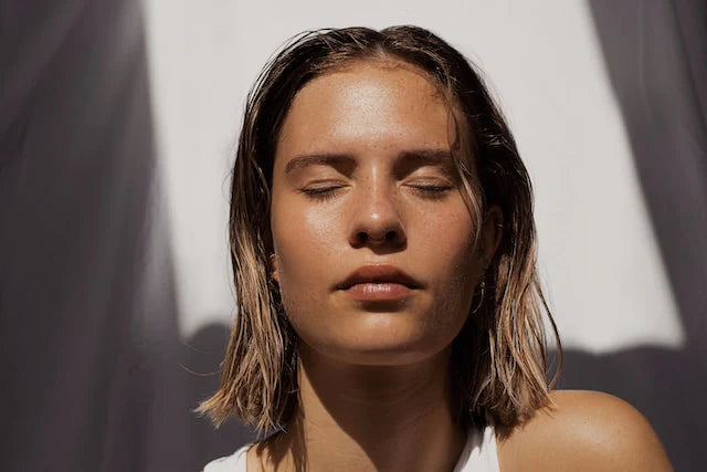 A woman with beautiful facial skin
