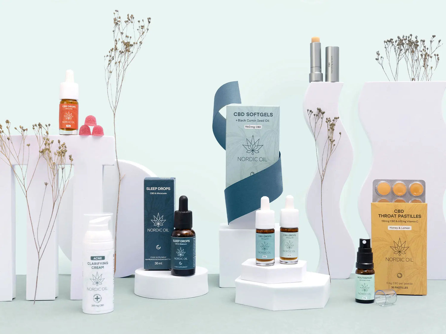 multiple cbd products presented together on ablue background